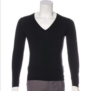 Men’s Burberry V-Neck sweater.